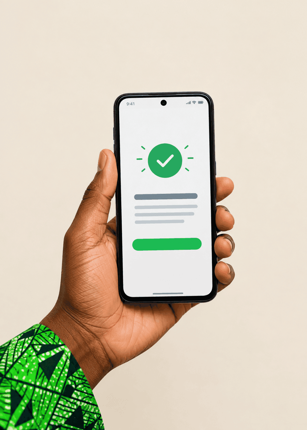 A hand holding an Android phone showing a completed bank transfer